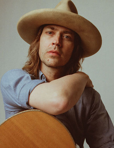 <div style="font-size:0.75em;color:#9c9837">Featured Entertainment</div>Rhett Miller